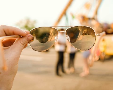 selective focus photography of sunglasses