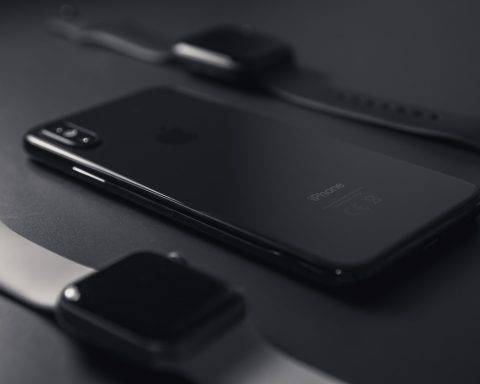 space grey iPhone X on black surface