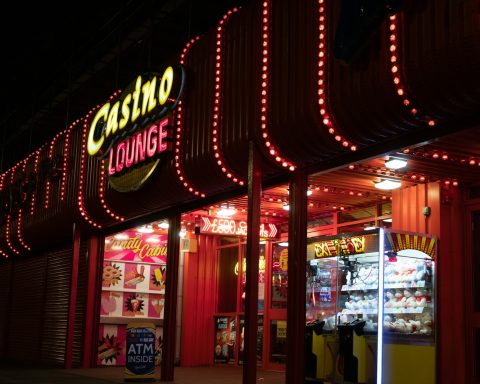 a lit up store front at night with a lot of lights