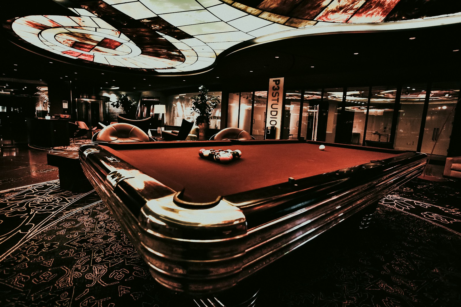 a pool table in the middle of a room